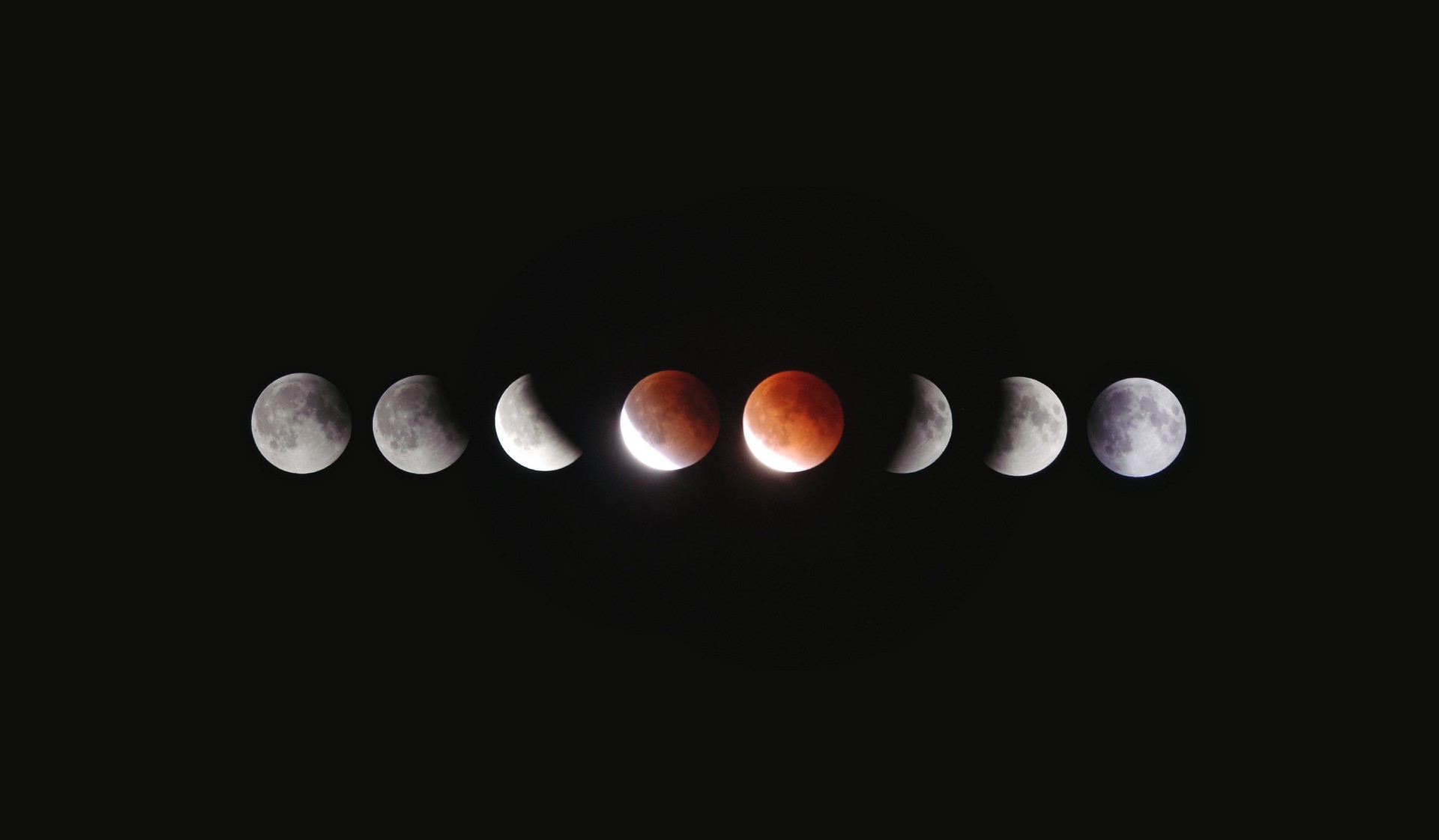 A picture of planets besides each other in the dark