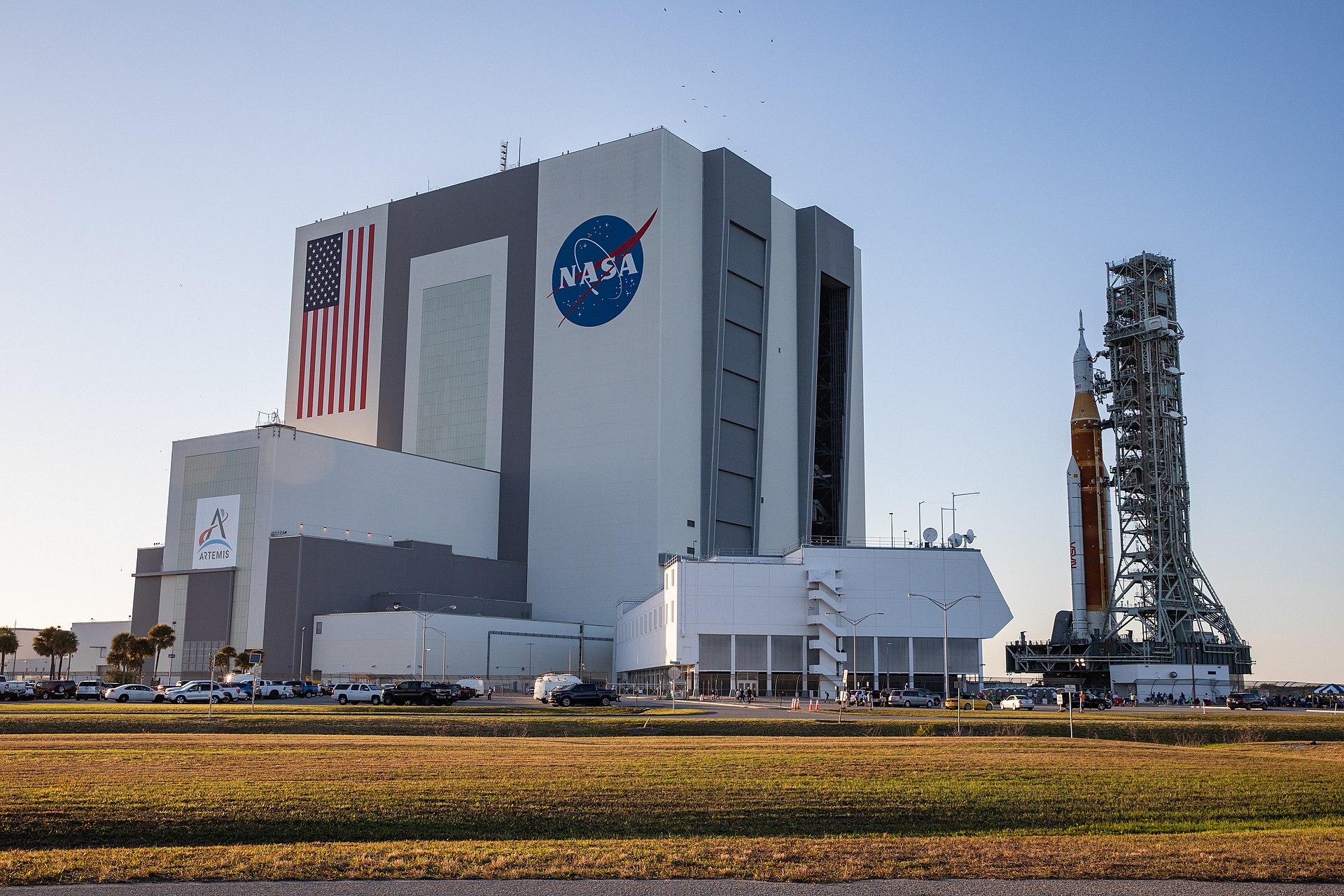 NASA Vehicle Assembly Building at Kennedy Space Center with the large American flag